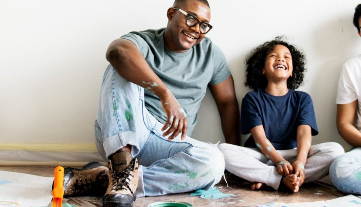 black-family-painting-house-wall-picture-id964765874 black-family-painting-house-wall-picture-id964765874