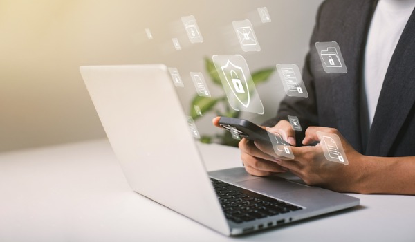 a-businessman-works-on-his-laptop-at-home-with-a-virtual-display-showing-a-symbol-to-signify.jpg_s=1024x1024&w=is&k=20&c=e7uAzHv3zDz9Q0pn0NQpJX8l7Ef1Us0ATJLdT6bVjP0=